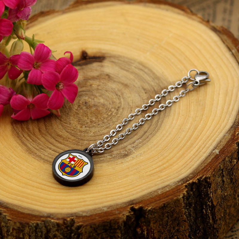 آویز ساعت زنانه ناکسیگو مدل شب تاب طرح بارسلونا کد AW7220